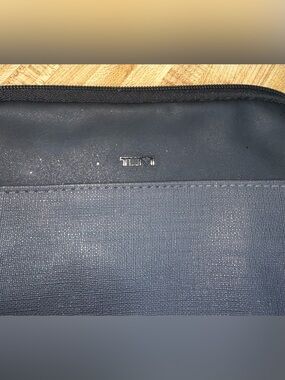 Tumi Navy and Black Travel Sleeve with Metal Logo